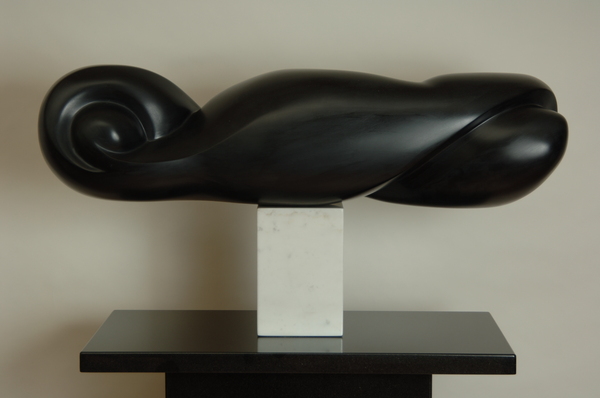 Balancing Act
African Wonderstone, Carrara Marble, Black Granite
9"H x 31"W x 8"D