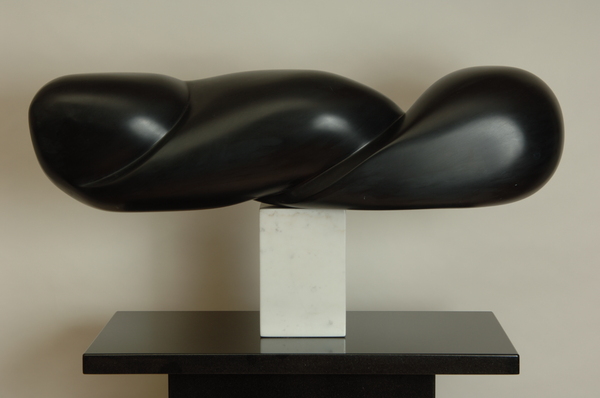 Balancing Act
African Wonderstone, Carrara Marble, Black Granite
9"D x 31"W x 8"D