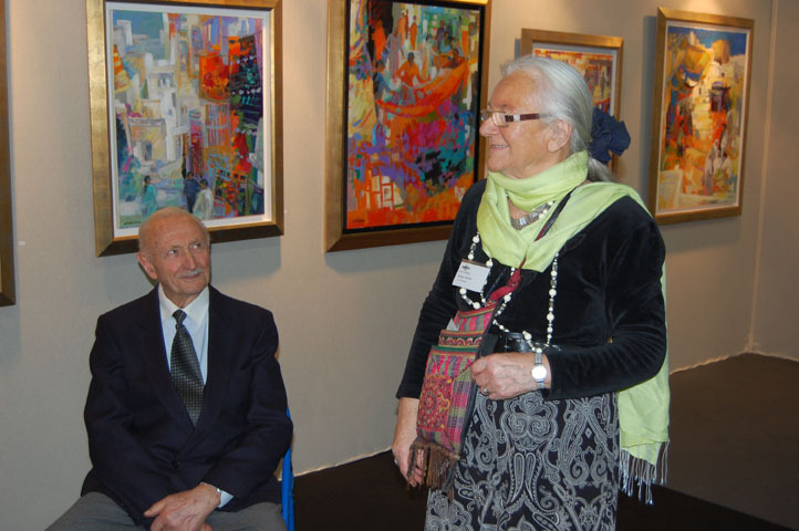 Monique Baroni has an admiring  from Franck Baroni